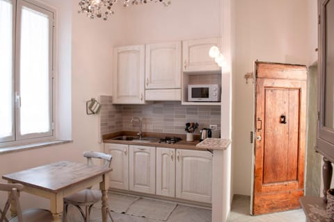 Kitchen or kitchenette, stove