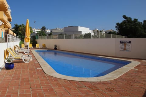 Property building, Living room, Swimming pool