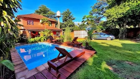 Property building, Patio, Garden, Pool view, Swimming pool, sunbed
