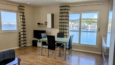 TV and multimedia, View (from property/room), Living room, Seating area, Dining area, Sea view