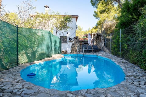 Property building, Living room, Swimming pool