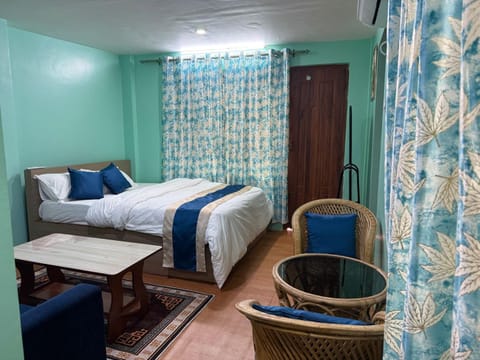 Bed, Seating area, Bedroom
