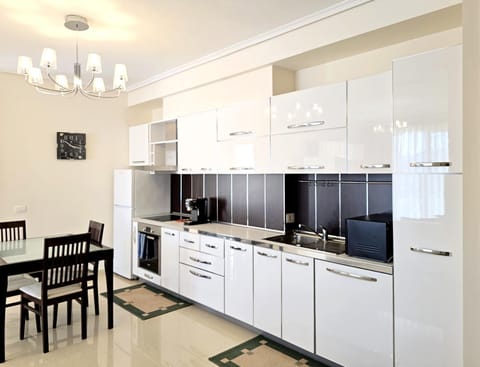 Kitchen or kitchenette, Dining area, dishwasher, oven, stove, toaster
