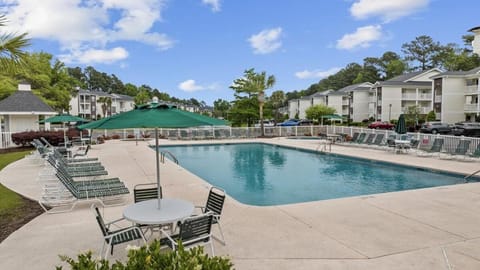 Property building, Patio, Spring, Day, Pool view, Swimming pool, sunbed