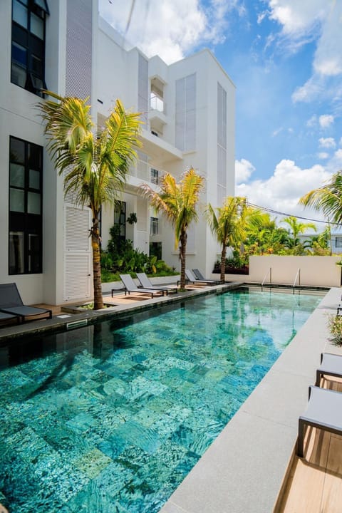 Property building, Day, Natural landscape, Pool view, Swimming pool, sunbed