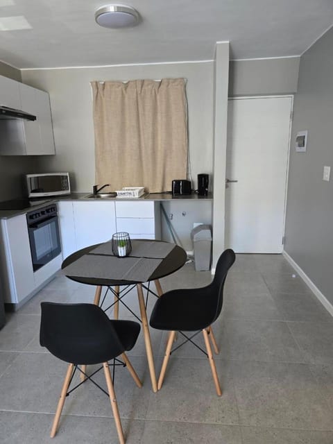 Kitchen or kitchenette, oven, stove