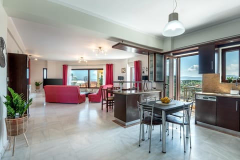 Kitchen or kitchenette, Living room, Seating area, Dining area