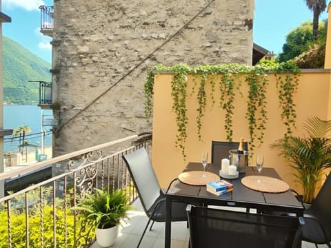 Property building, Facade/entrance, Summer, View (from property/room), Balcony/Terrace, Dining area, Lake view, Mountain view