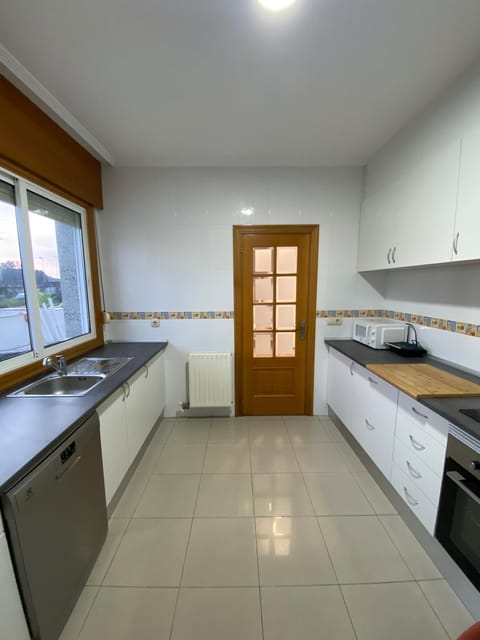 Kitchen or kitchenette, microwave, oven