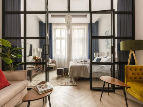 Bed, Living room, Seating area, Bedroom