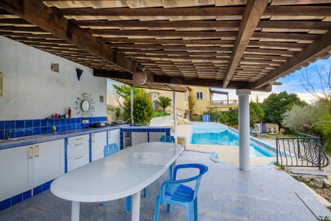 Property building, Living room, Swimming pool