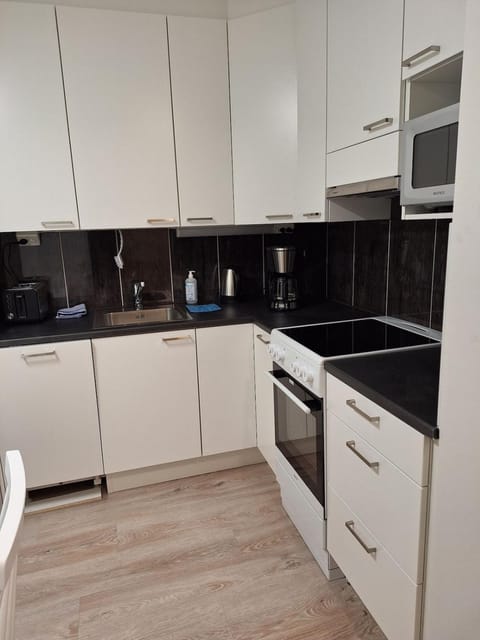 Kitchen or kitchenette, oven