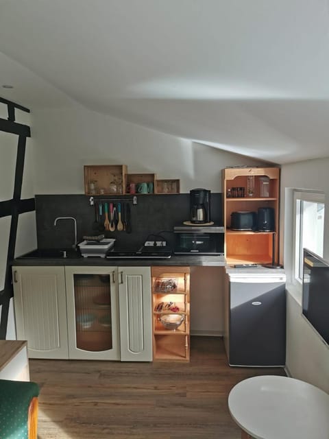 Kitchen or kitchenette, stove