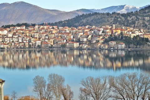 Property building, Nearby landmark, Natural landscape, City view, Lake view, Mountain view