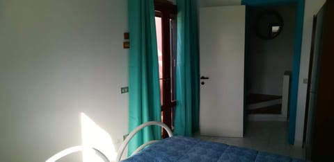 A window on the saline beach House in Sardinia