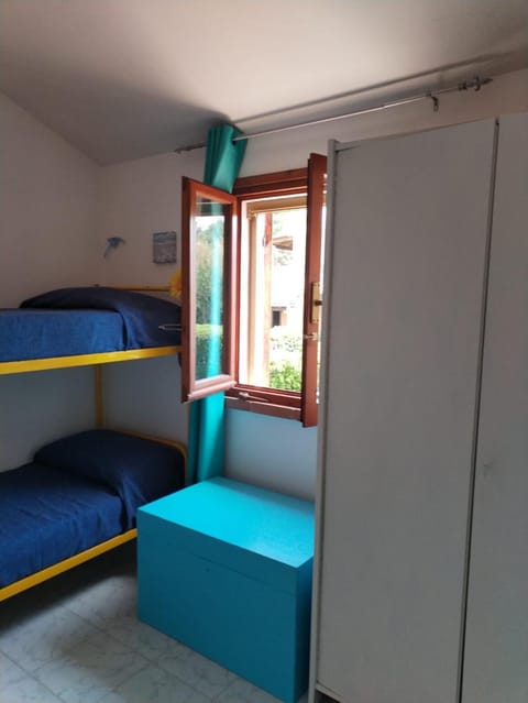 A window on the saline beach House in Sardinia