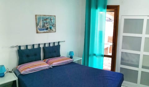 A window on the saline beach House in Sardinia