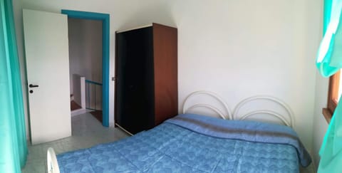 A window on the saline beach House in Sardinia