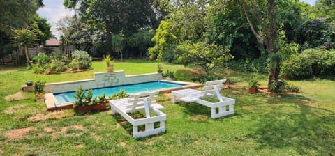 Natural landscape, Garden, Garden view, Pool view, Swimming pool, sunbed