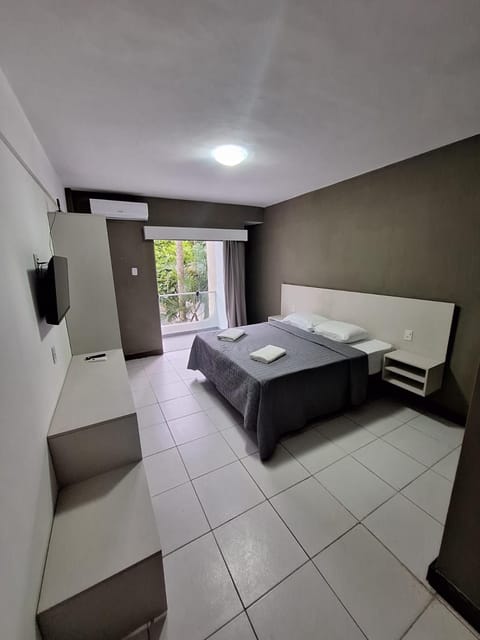 Bathroom, TV and multimedia, locker, minibar, towels, air conditioner
