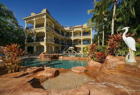 The Winslet Estate - Luxury riverfront 3-story home w/bar, gym, and heated pool - SWFL Rentals Villa in Cape Coral