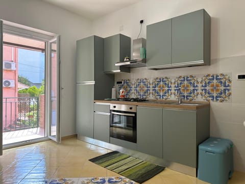 Kitchen or kitchenette, oven, stove