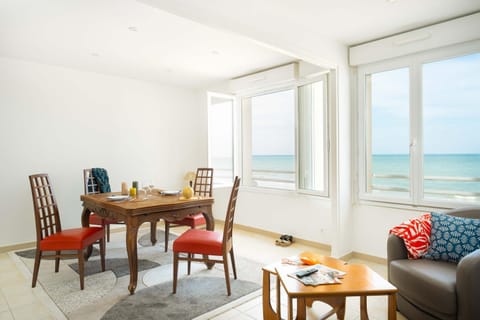 Living room, Seating area, Dining area, Beach, Sea view