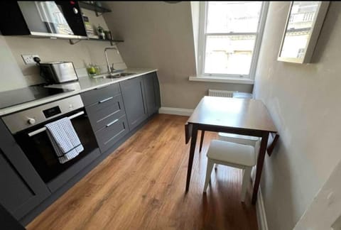 Kitchen or kitchenette, Dining area, oven, stove, toaster