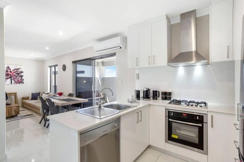 Kitchen or kitchenette, Living room, Dining area, dishwasher, oven, toaster