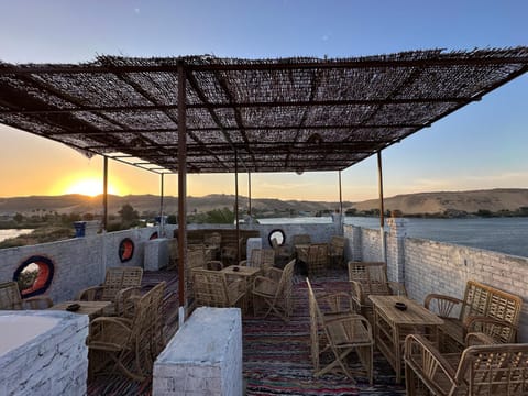 Natural landscape, Seating area, Mountain view, River view, Sunset