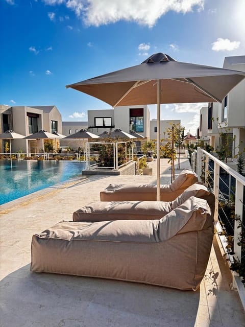 Property building, Patio, Facade/entrance, Day, View (from property/room), Balcony/Terrace, Seating area, Pool view, Swimming pool, Swimming pool, sunbed