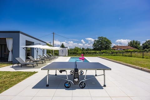 Patio, Day, Table tennis, Pool view, Swimming pool, sunbed