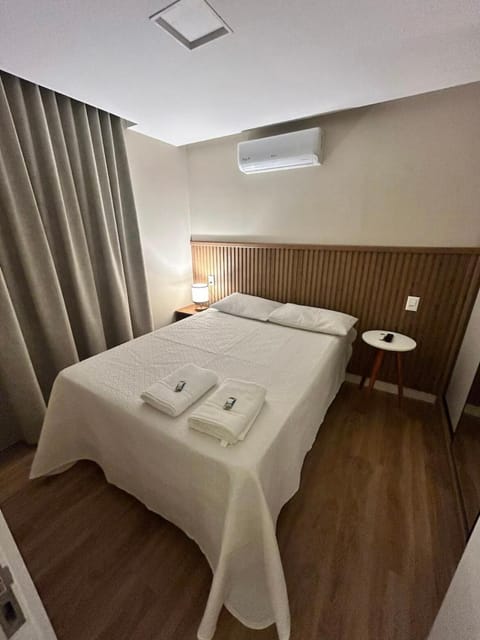 Bed, Photo of the whole room, Bedroom, towels, air conditioner
