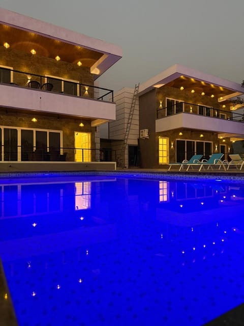 Property building, Night, Swimming pool