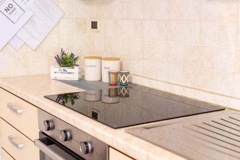 Kitchen or kitchenette, stove