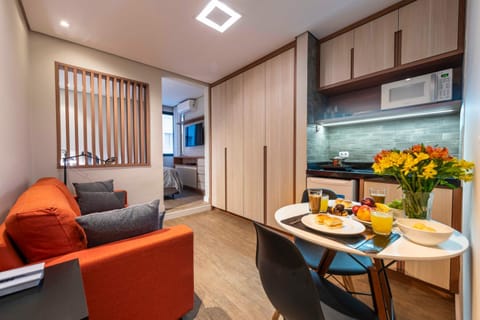 Kitchen or kitchenette, Living room, Seating area, Dining area