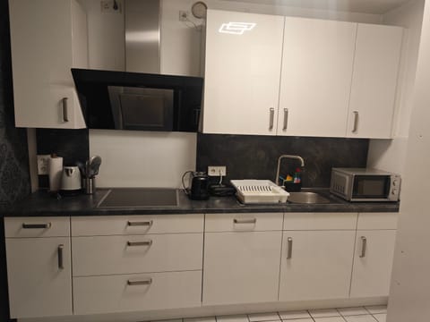 Kitchen or kitchenette, stove, toaster
