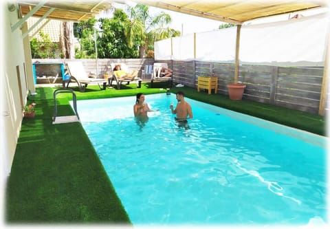 Swimming pool, sunbed