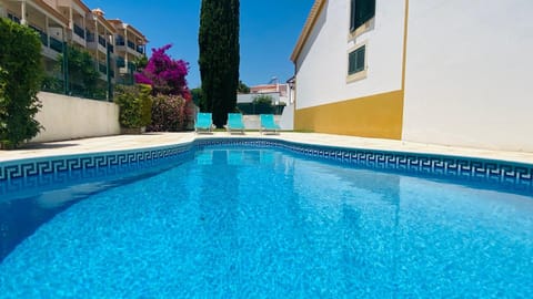 Swimming pool, sunbed