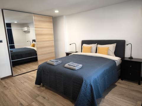 Bed, Photo of the whole room, Bedroom, towels, wardrobe