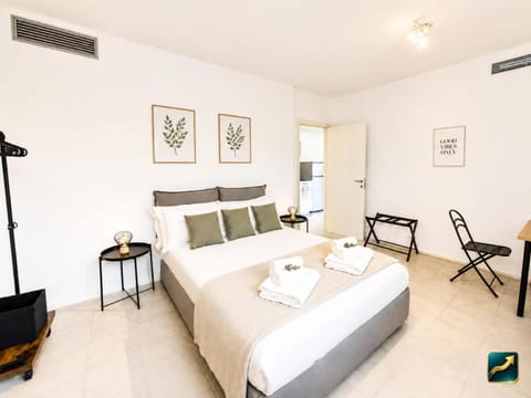 Bed, Photo of the whole room, Bedroom, towels, air conditioner