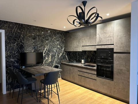 Kitchen or kitchenette, Dining area, stove