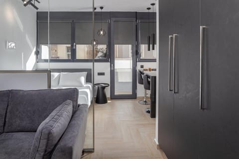 Bed, Living room, Seating area, Bedroom