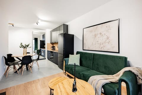 Kitchen or kitchenette, Living room, Seating area, Dining area