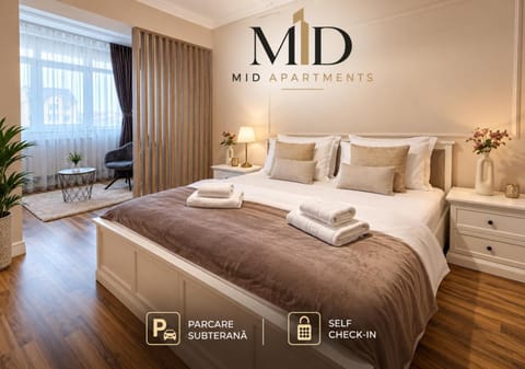 Bed, Property logo or sign, Photo of the whole room, Logo/Certificate/Sign, Bedroom, towels