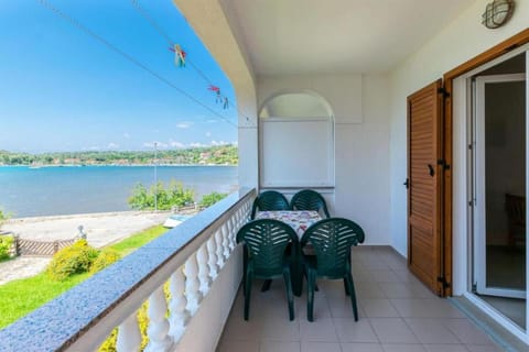 Apartment in Lopar with sea view, balcony, air conditioning, Wi-Fi 4419-4 Apartment in Lopar