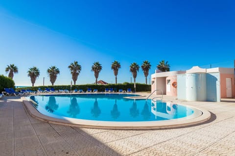 Swimming pool, sunbed