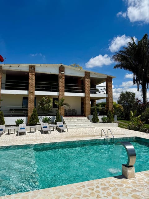 Property building, Patio, Day, Pool view, Swimming pool