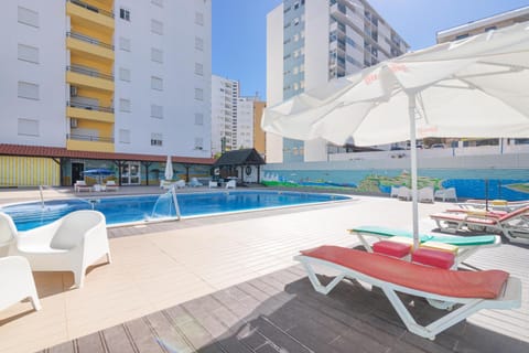 Property building, Living room, Swimming pool
