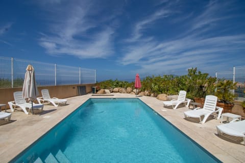 Property building, Living room, Swimming pool